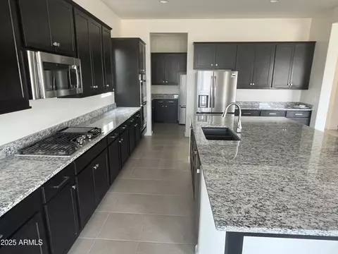 Kitchen - 9744 E Spiral Ave, Mesa, AZ 85212 photo 2 of 6