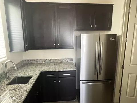 Kitchen - 9744 E Spiral Ave, Mesa, AZ 85212 photo 3 of 5