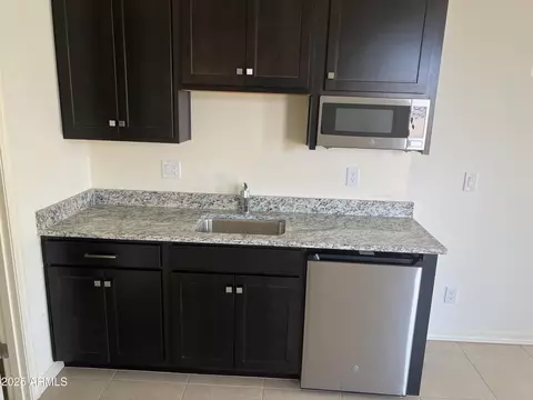 Kitchen - 9744 E Spiral Ave, Mesa, AZ 85212 photo 5 of 6