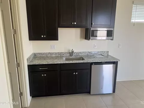 Kitchen - 9744 E Spiral Ave, Mesa, AZ 85212 photo 4 of 6