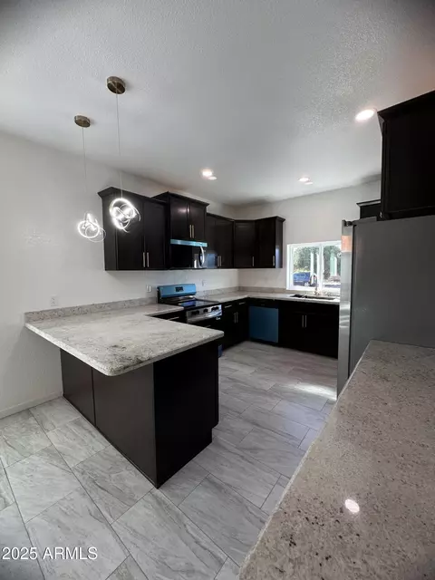 Kitchen - 722 E 3rd St, Douglas, AZ 85607 photo 1 of 2
