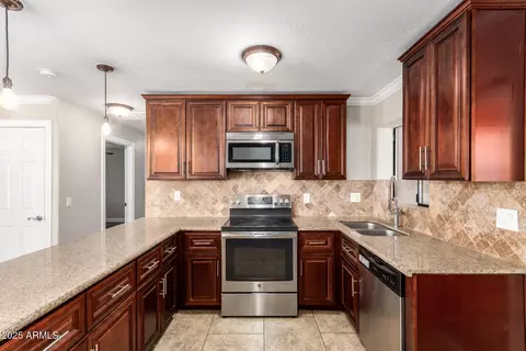 Kitchen - 8310 E University Dr, Mesa, AZ 85207 photo 1 of 2