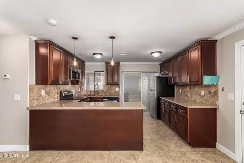 Kitchen - 8310 E University Dr, Mesa, AZ 85207 photo 2 of 2