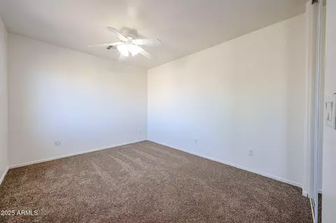 Bedroom - 11627 W Hackbarth Dr, Youngtown, AZ 85363 photo 8 of 10
