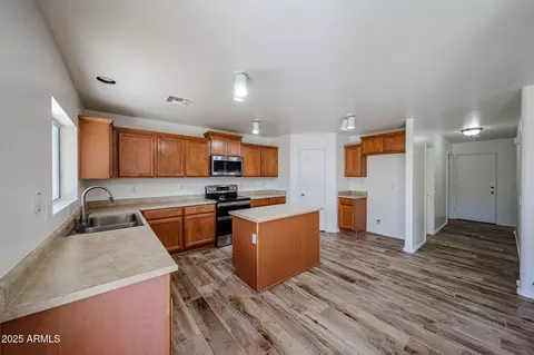 Kitchen - 11627 W Hackbarth Dr, Youngtown, AZ 85363 photo 2 of 4