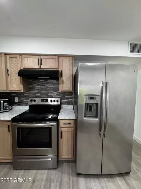Kitchen - 128 W Winston Dr, Phoenix, AZ 85041 photo 2 of 3