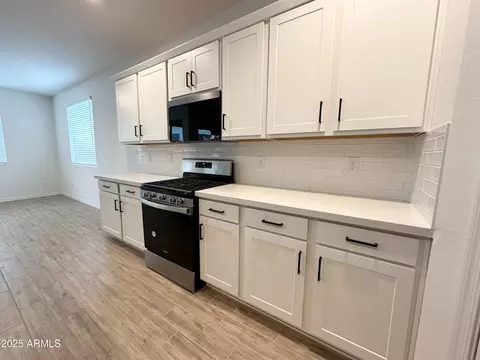 Kitchen - 9363 E Spiral Ave, Mesa, AZ 85212 photo 3 of 7