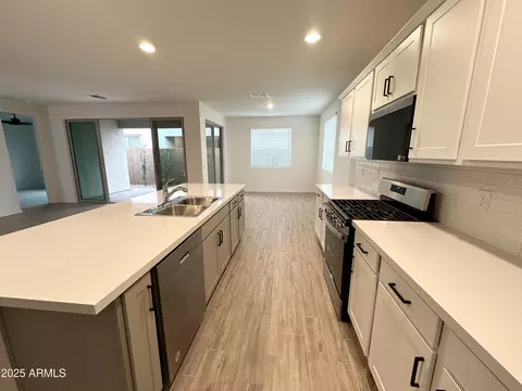 Kitchen - 9363 E Spiral Ave, Mesa, AZ 85212 photo 5 of 7