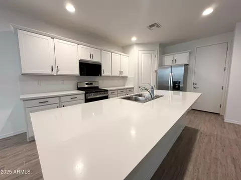 Kitchen - 9363 E Spiral Ave, Mesa, AZ 85212 photo 1 of 7