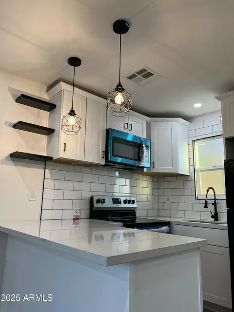 Kitchen - 1447 E Mountain View Rd, Phoenix, AZ 85020 photo 1 of 4