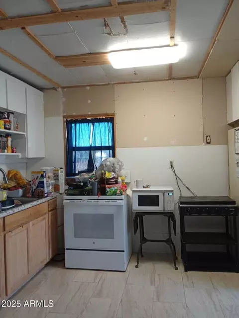 Kitchen - 312 E 6th St, Benson, AZ 85602 photo 1 of 2