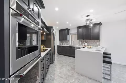 Kitchen - 1709 E Gelding Dr, Phoenix, AZ 85022 photo 4 of 8