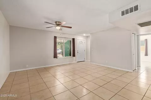 Living - 1124 N 59th Dr, Phoenix, AZ 85043 photo 1 of 4
