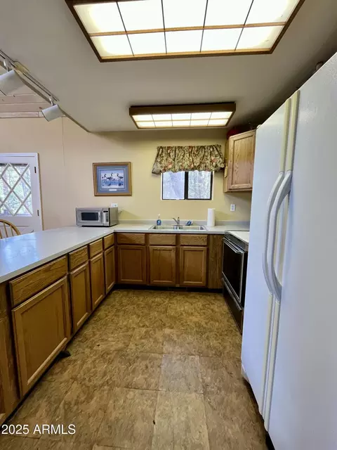 Kitchen - 6314 W Bradshaw Dr, Pine, AZ 85544 photo 2 of 2