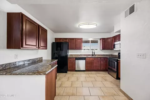 Kitchen - 3823 W Lawrence Rd, Phoenix, AZ 85019 photo 2 of 5