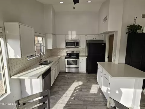 Kitchen - 1131 N Hawk Ln, Gilbert, AZ 85234 photo 2 of 3