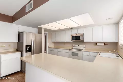 Kitchen - 10505 E Silvertree Dr, Sun Lakes, AZ 85248 photo 2 of 3
