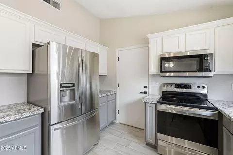 Kitchen - 5053 E Harmony Ave, Mesa, AZ 85206 photo 3 of 5
