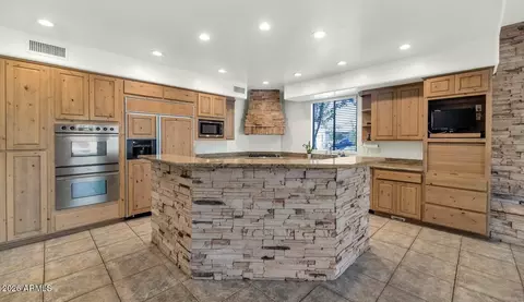 Kitchen - 1404 E Michelle Dr, Phoenix, AZ 85022 photo 3 of 5