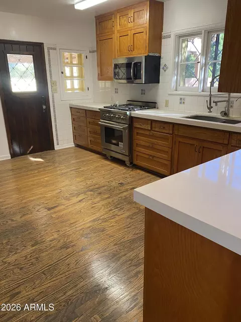 Kitchen - 520 E Orange Dr, Phoenix, AZ 85012 photo 3 of 3