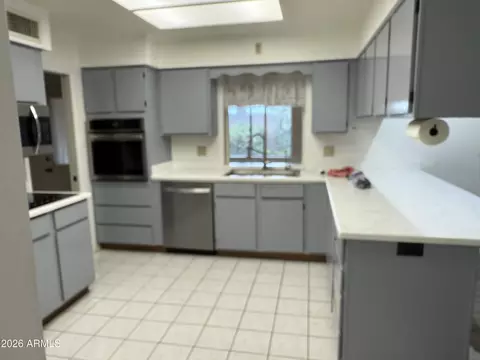 Kitchen - 7822 E Lindner Ave, Mesa, AZ 85209 photo 1 of 2