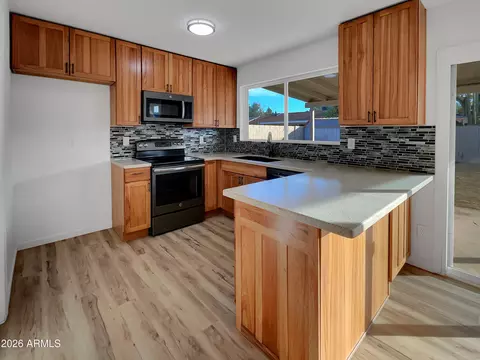 Kitchen - 2339 E Harmony Ave, Mesa, AZ 85204 photo 2 of 3