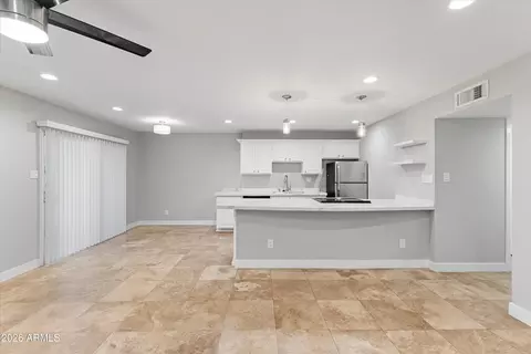 Living - 5525 E Thomas Rd #L1, Phoenix, AZ 85018 photo 3 of 7