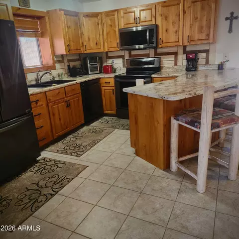 Kitchen - 1038 E Friar Ave, Apache Junction, AZ 85119 photo 2 of 3