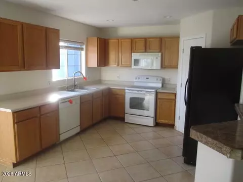 Kitchen - 300 5th Ave, Buckeye, AZ 85326 photo 2 of 3