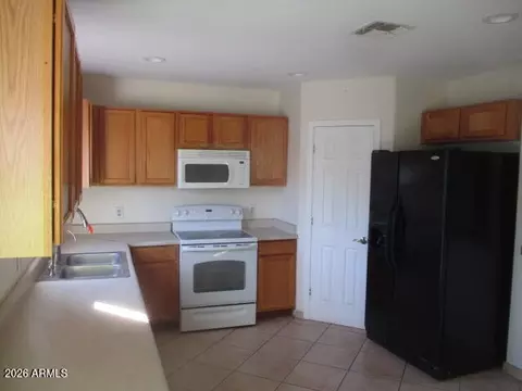 Kitchen - 300 5th Ave, Buckeye, AZ 85326 photo 3 of 3