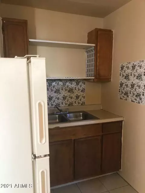 Kitchen - 1165 E 10th St, Douglas, AZ 85607 photo 7 of 9