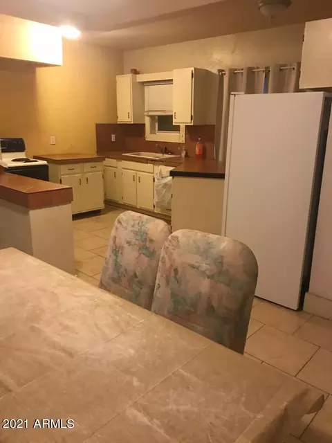 Kitchen - 1165 E 10th St, Douglas, AZ 85607 photo 8 of 9