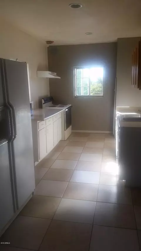 Kitchen - 1165 E 10th St, Douglas, AZ 85607 photo 5 of 9