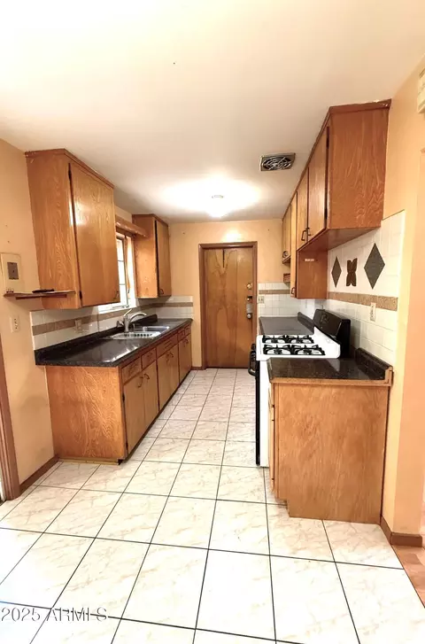 Kitchen - 4450 W Weldon Ave, Phoenix, AZ 85031 photo 1 of 1