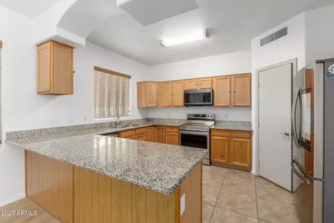 Kitchen - 8737 E Laguna Azul Ave, Mesa, AZ 85209 photo 1 of 2
