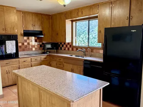 Kitchen - 104 Locklin Ave # D, Bisbee, AZ 85603 photo 1 of 2