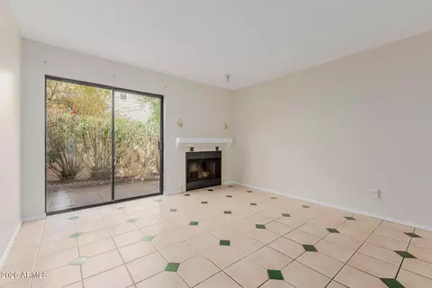 Living - 720 E Alice Ave #107, Phoenix, AZ 85020 photo 2 of 3