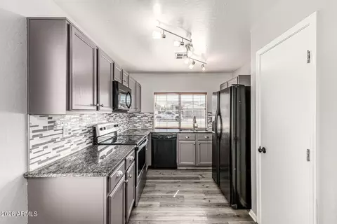 Kitchen - 7522 E Lobo Ave, Mesa, AZ 85209 photo 1 of 2