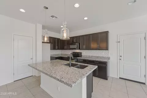 Kitchen - 9827 E Kinetic Dr, Mesa, AZ 85212 photo 5 of 5