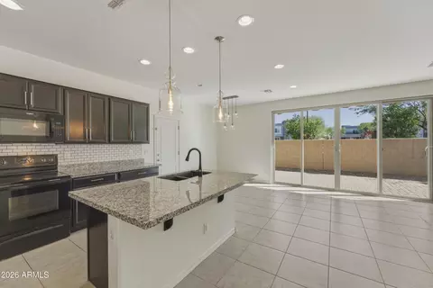 Kitchen - 9827 E Kinetic Dr, Mesa, AZ 85212 photo 3 of 5