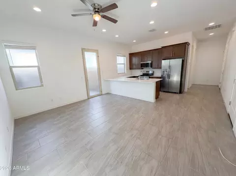 Living - 4411 N 93rd Dr, Phoenix, AZ 85037 photo 6 of 7