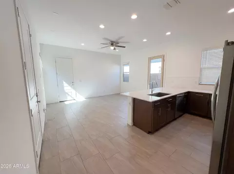 Living - 4411 N 93rd Dr, Phoenix, AZ 85037 photo 5 of 7
