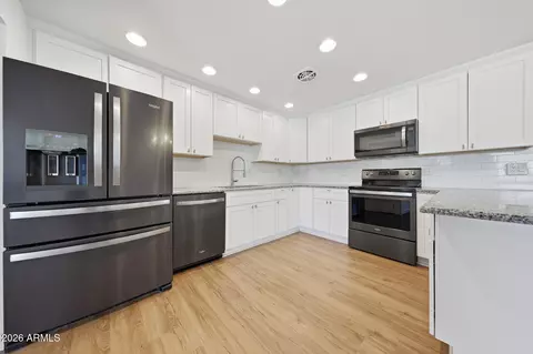 Kitchen - 3540 E Voltaire Dr, Phoenix, AZ 85032 photo 1 of 2