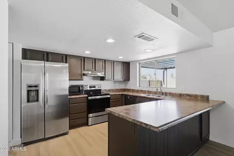 Kitchen - 8652 W Heatherbrae Dr, Phoenix, AZ 85037 photo 1 of 3