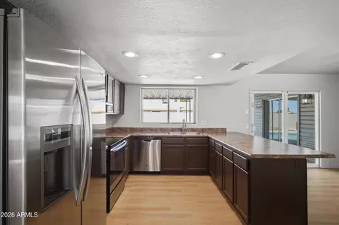 Kitchen - 8652 W Heatherbrae Dr, Phoenix, AZ 85037 photo 3 of 3
