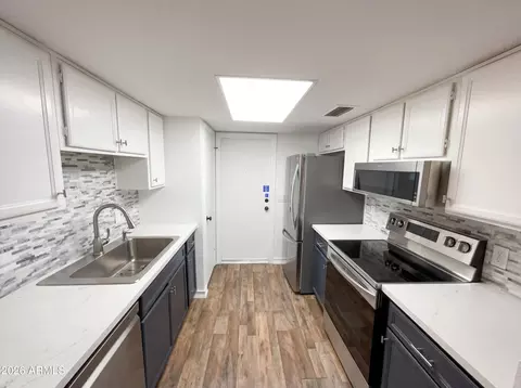 Kitchen - 406 E Behrend Dr, Phoenix, AZ 85024 photo 3 of 3