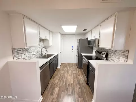 Kitchen - 406 E Behrend Dr, Phoenix, AZ 85024 photo 2 of 3