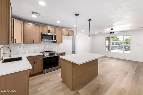 Kitchen - 335 W Vineyard Rd, Phoenix, AZ 85041 photo 1 of 2
