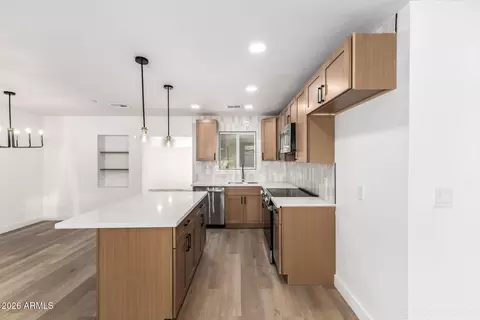 Kitchen - 335 W Vineyard Rd, Phoenix, AZ 85041 photo 2 of 2