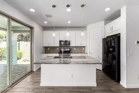Kitchen - 9916 E Kinetic Dr, Mesa, AZ 85212 photo 3 of 3